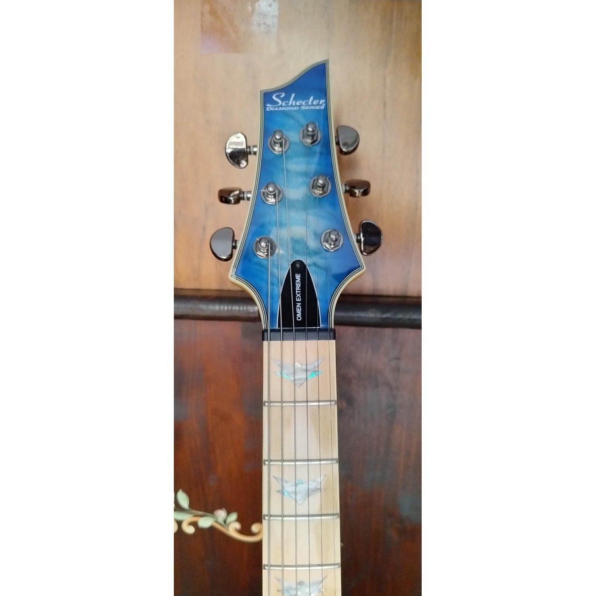 Schecter Omen Extreme 6-TR-M-OBB, usata