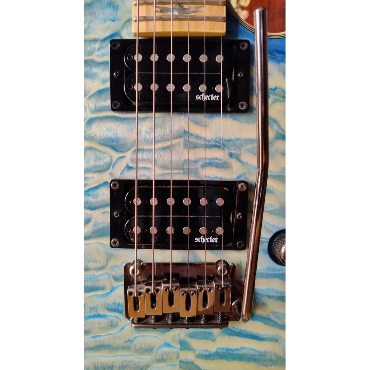 Schecter Omen Extreme 6-TR-M-OBB, usata
