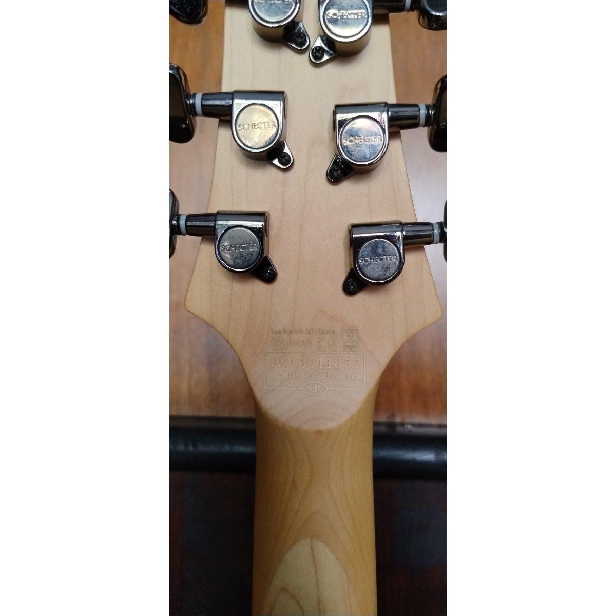 Schecter Omen Extreme 6-TR-M-OBB, usata